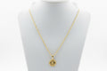 18K gold fill 3 mm 18“ Cuban link chain with round flower ￼pendant.