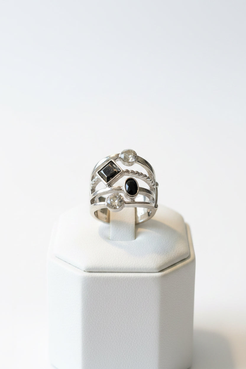 Dolls Silver plated Stretch Ring multi-band fashion ring with a dark center stone and a geometric accent.